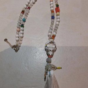 Very nice long necklace with Mexican skull and pompom
